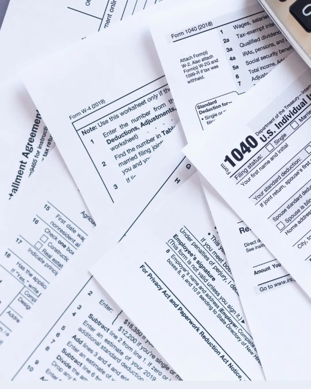 US tax forms and a pencil