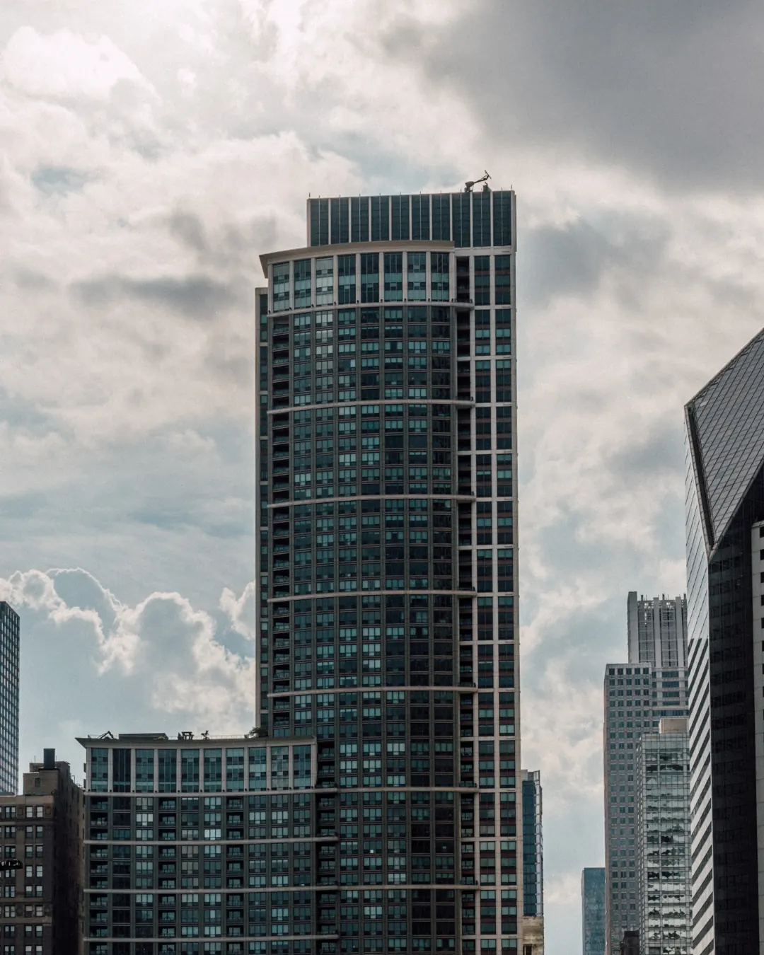 A skyscraper against the clouds